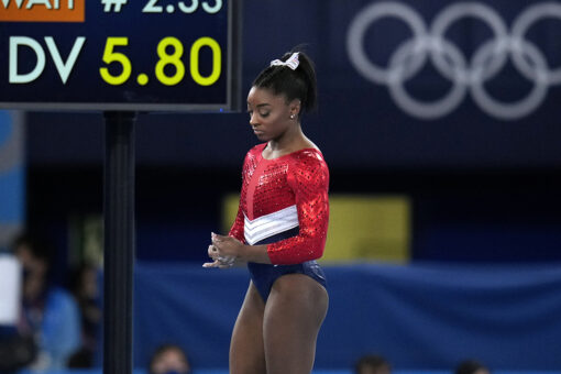 Simone Biles withdraws from vault and bars, may still compete on floor and beam