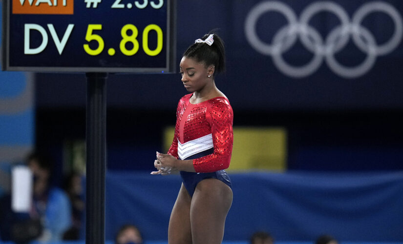 Simone Biles withdraws from vault and bars, may still compete on floor and beam