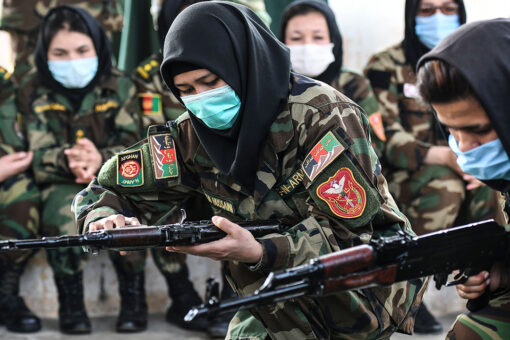 Afghan women carry guns in streets, protest Taliban as country struggles