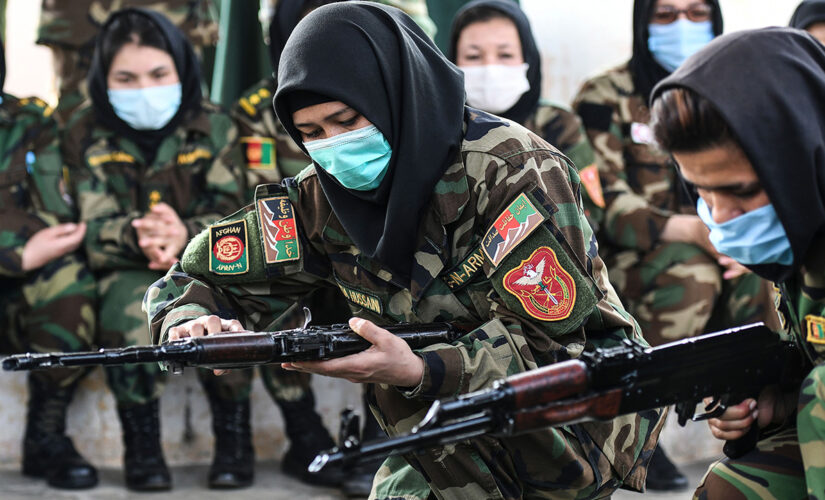 Afghan women carry guns in streets, protest Taliban as country struggles