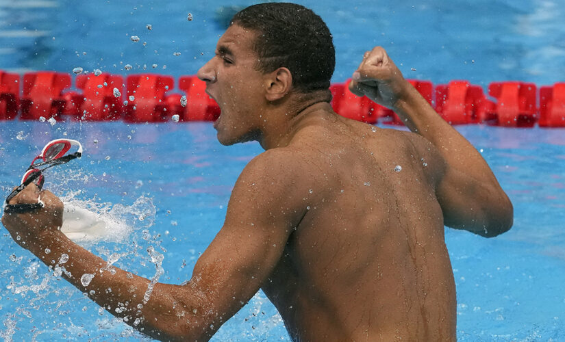 Tunisian teen wins surprise Olympic swimming gold
