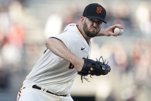 Wood goes 7 to win 8th, Giants beat Cardinals 5-2