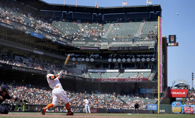 Crawford homers, Giants assured MLB’s top record at break