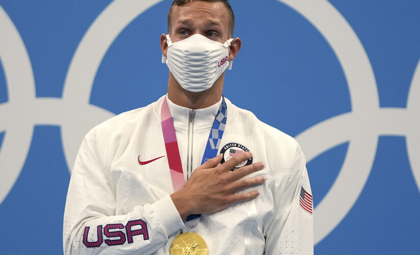 Olympian Caeleb Dressel tears up on gold medal stand while national anthem plays