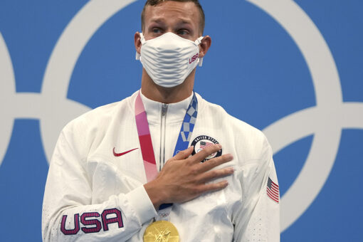 Olympian Caeleb Dressel tears up on gold medal stand while national anthem plays