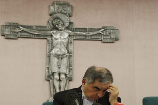 Cardinal, 9 others on trial at Vatican in money scandals