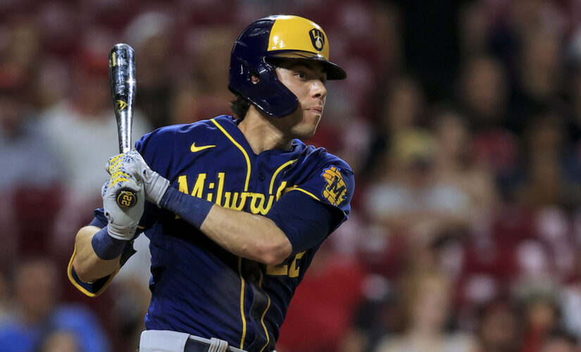 Yelich hits RBI double in 11th, Brewers top Reds, widen lead