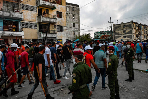 Cuban regime supporters seen brandishing large clubs as protest crackdown continues