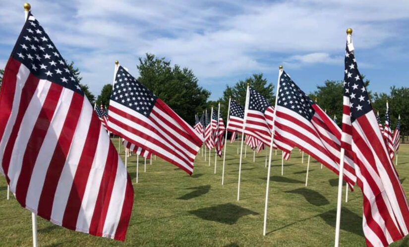 North Carolina Scout troops camp out, watch over American flag display