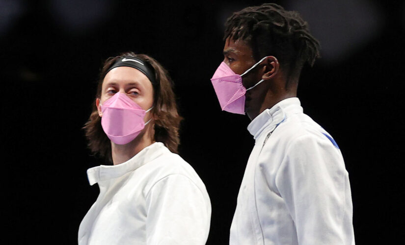 US fencer accused of sexual misconduct confronts teammates after pink mask protest on Olympic stage