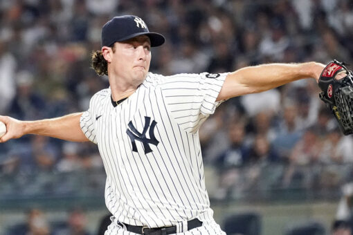 Cole, Yankees withstand rain to beat Red Sox 3-1