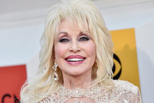 Dolly Parton recreates iconic Playboy cover shoot for husband’s birthday: ‘He still thinks I’m a hot chick’