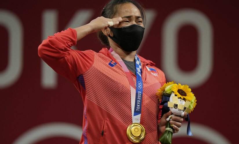 Philippines’ first Olympic gold medalist will receive cash, new condo
