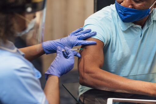 States race to use COVID-19 vaccines before they expire