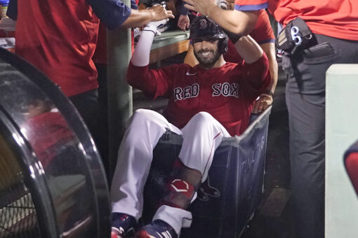 Martinez, Renfroe lift Red Sox over Royals 6-2 amid delays