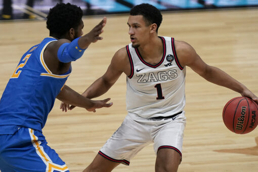 Choosing basketball over football was tough for Jalen Suggs
