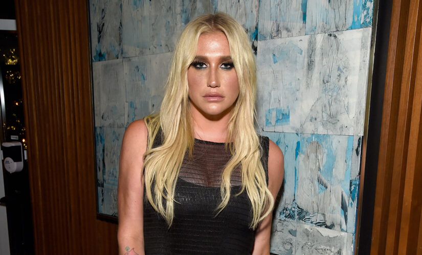 Kesha stuns in sheer black dress paired with thong bodysuit at movie premiere