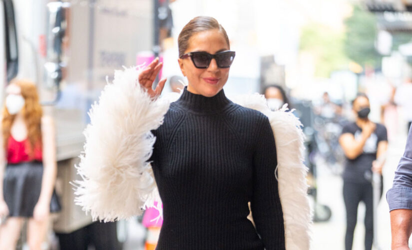 Lady Gaga continues to impress in angel wings, platform heels and a little black dress