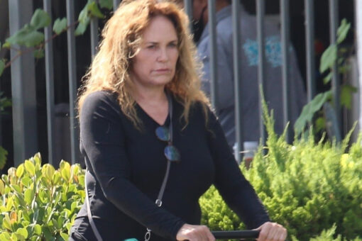 ‘Dukes of Hazzard’ star Catherine Bach enjoys a stroll with her ‘puppies’ in Los Angeles