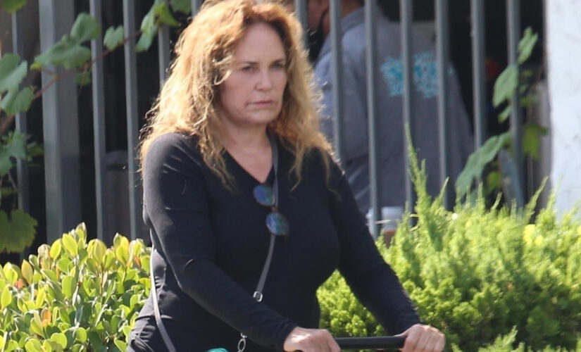 ‘Dukes of Hazzard’ star Catherine Bach enjoys a stroll with her ‘puppies’ in Los Angeles