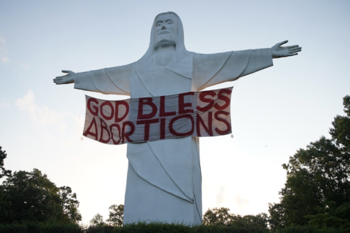 ‘GOD BLESS ABORTIONS’ banner hung on Christ of the Ozarks statue in Arkansas by activist art group