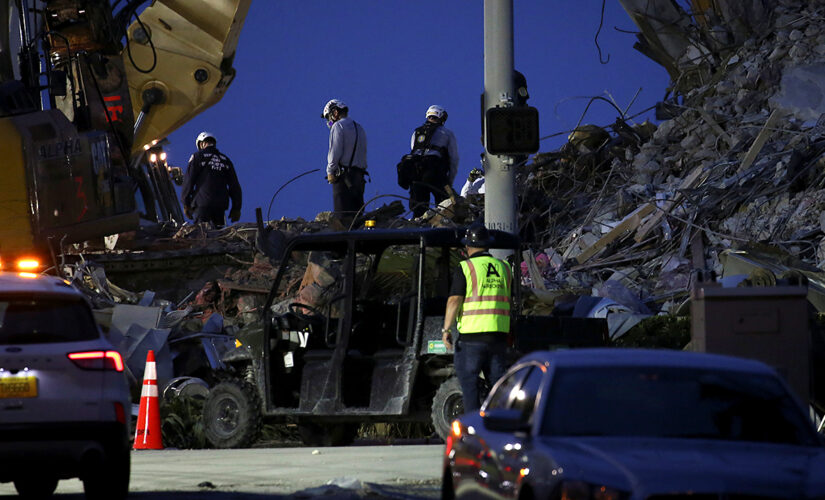 Rescuers at Florida condo collapse told they can go home, but they refuse