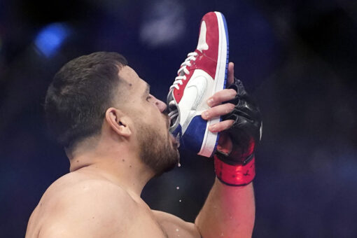 Tai Tuivasa chugs beer from shoe after knocking out Greg Hardy at UFC 264