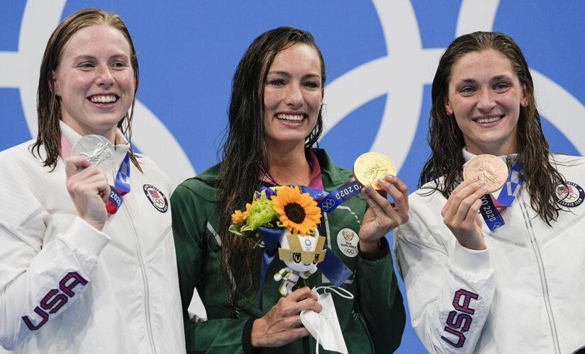 South African sets world swim record; Aussies add 6th gold