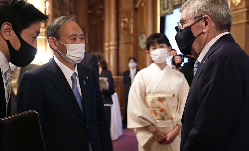 Japanese PM Suga says world should see safe Olympics staged