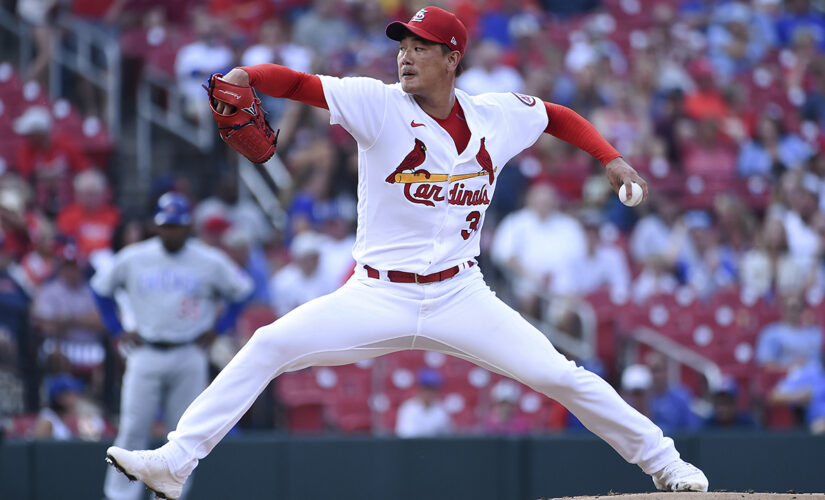 Kim earns 5th straight win on birthday, Cards beat Cubs 3-2