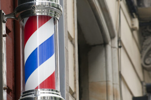 Detroit woman spots car-theft suspect in barbershop, drags him by his dreadlocks: report