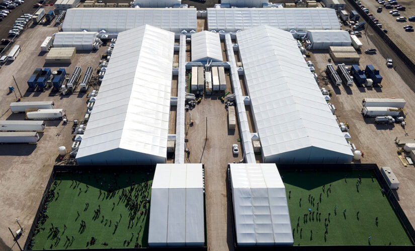 COVID cases spiking in migrant detention centers, report says