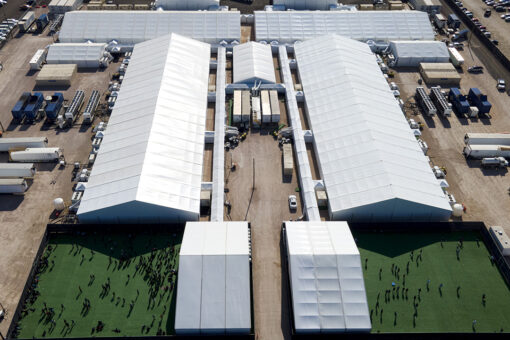 COVID cases spiking in migrant detention centers, report says