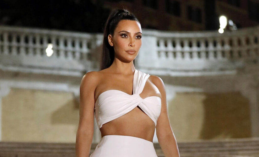 Kim Kardashian wows in revealing white dress on Spanish Steps after facing flack for sexy getup at Vatican