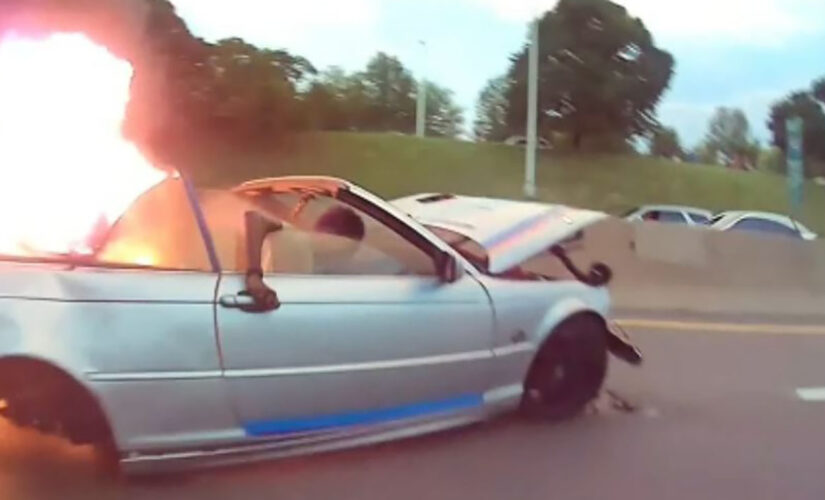 Michigan police officer pulls fiery car crash victim to safety in dramatic new video: ‘Timing was perfect’