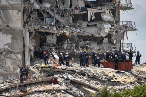 Woman trapped in condo rubble pleaded with rescuers to save her