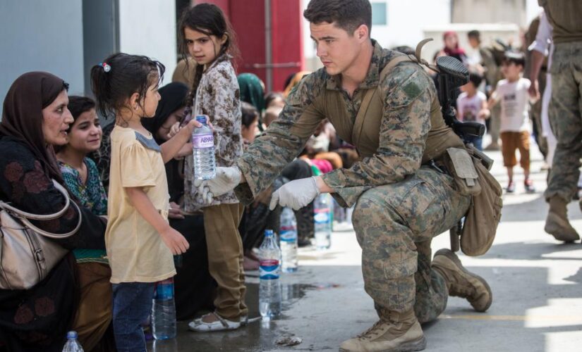 Infants, children being rescued in Afghanistan seen in gripping photos