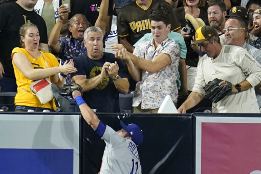 Dodgers’ AJ Pollock steals home run from Padres’ Manny Machado