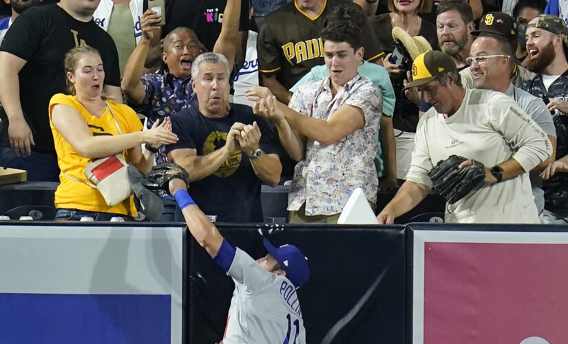 Dodgers’ AJ Pollock steals home run from Padres’ Manny Machado