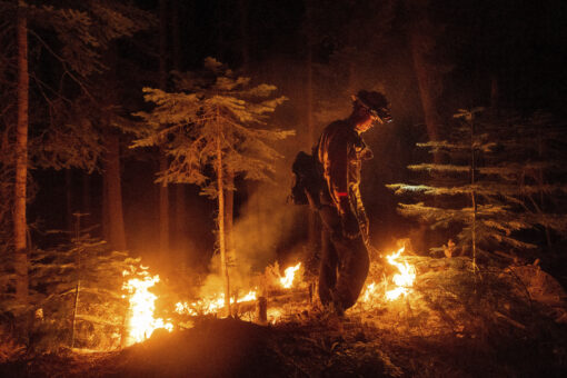 Wildfire crews move closer to containing massive blazes, but other problems persist