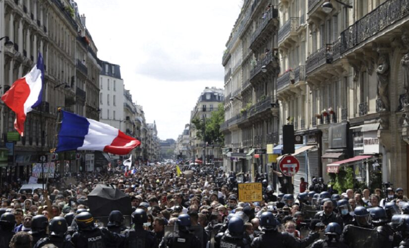 French police clash with anti-virus pass protesters in Paris