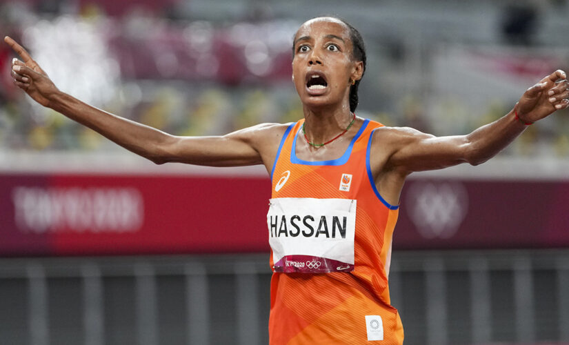 No keeping her down: After a fall, busy Hassan gets a gold