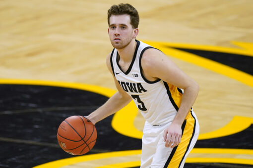 Former football player charged in Iowa hoops star’s assault