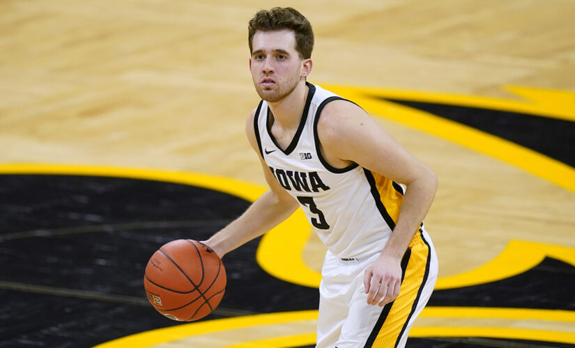 Former football player charged in Iowa hoops star’s assault