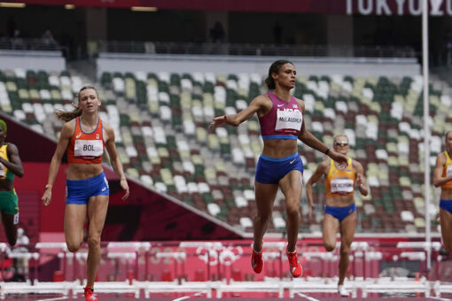 McLaughlin outsprints teammate Muhammad for hurdles record