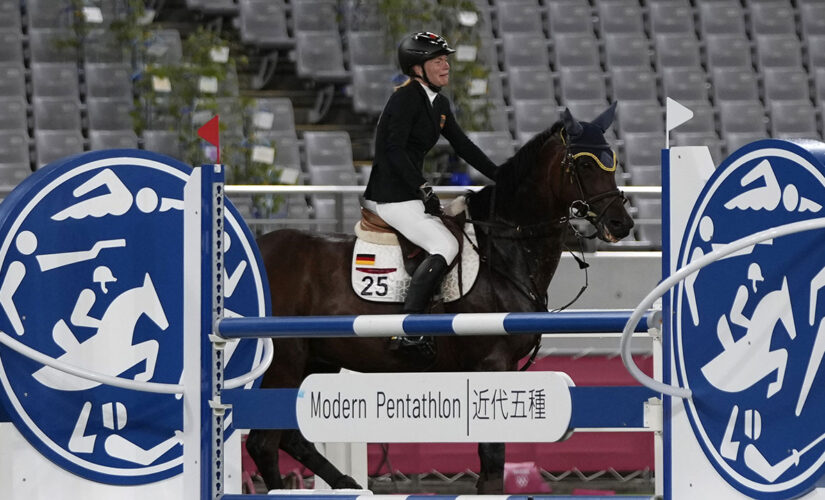 German coach booted from Olympics after punching horse during women’s pentathlon