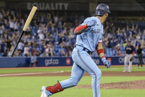 Blue Jays use 9-run 5th to beat skidding Red Sox 12-4