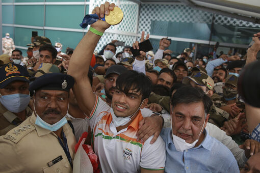 Olympic gold medalist Chopra returns to India as superstar