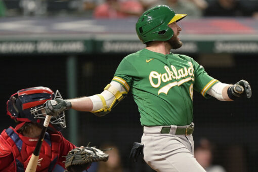 Lowrie doubles in 10th, A’s top Indians for 5th win in row