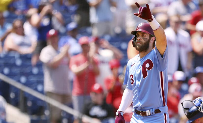 Harper, Phillies hold off Dodgers 2-1 to avoid sweep